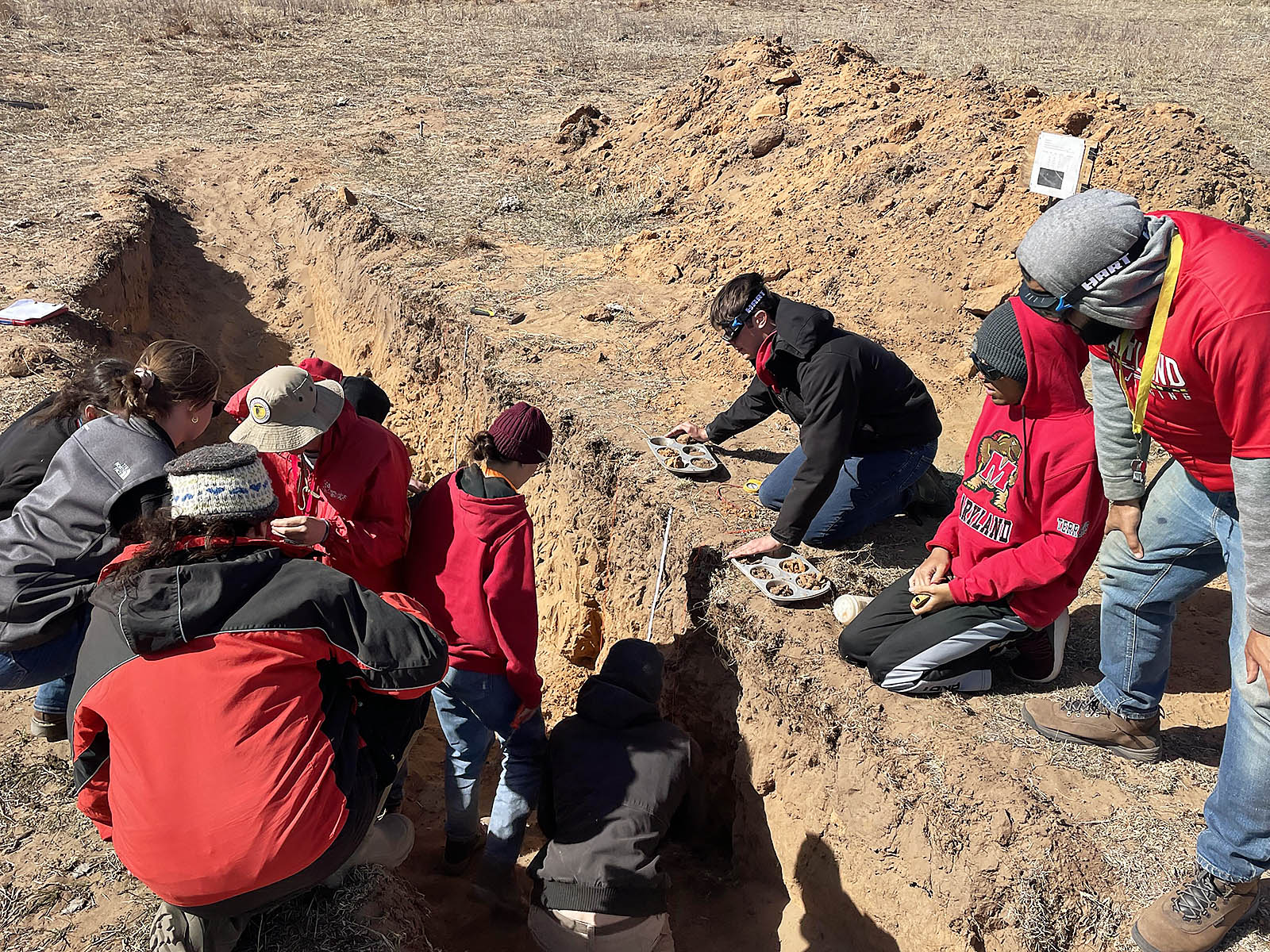 Students in soil pit